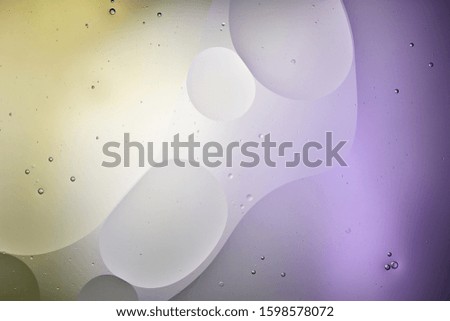 Beautiful purple and green color abstract background from mixed water and oil