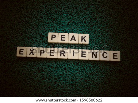 Peak Experience, word cube with background.