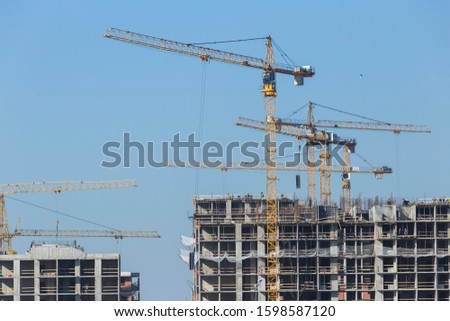 Photos about real estate construction and construction equipment