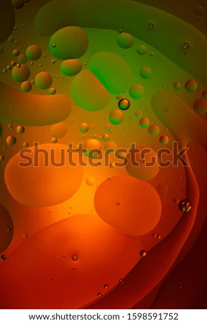abstract green and red color background from mixed water and oil 