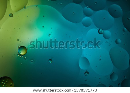 Beautiful abstract turquoise color background from mixed water and oil 