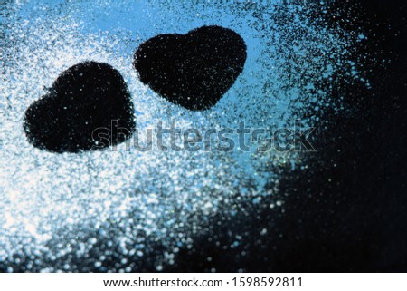 Background texture with the image of two hearts on valentines day 