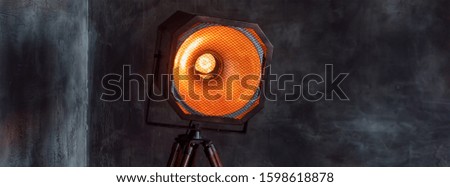 Vintage light source lamp, loft light. Background photo with copy space for text.