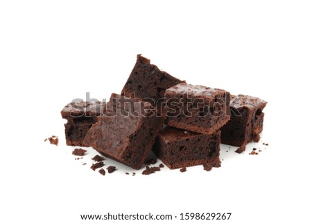 Heap of delicious chocolate cake slices isolated on white background
