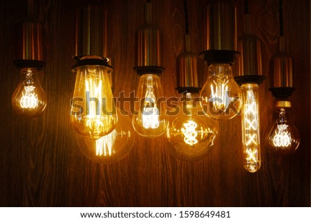 Vintage or retro lamp on old wall in home, Feeling romantic in old home with retro light, Lighting equipment in interior home with dark light picture style                                             