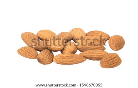 Almond nuts heap isolated on white. Entire image is sharpness.
