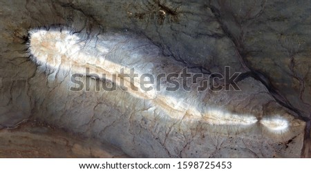 the luminous wound, abstract photography of the deserts of Africa from the air, aerial view of desert landscapes, Genre: Abstract Naturalism, from the abstract to the figurative,contemporary photo art