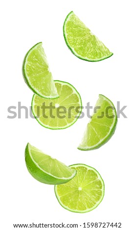 Collage of falling limes on white background Royalty-Free Stock Photo #1598727442