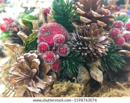 New Year's decor. Decorations for Christmas. Christmas tree decorations. 
Needles and cones. Pine and spruce. 
A wreath of cones. Apple.