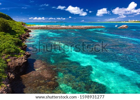 This is a summer seascape at Kurima island in Okinawa Prefecture, Japan.
Kurima island is the one of Miyako islands, and also well known as a tourist destination in this prefecture.