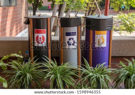 Hazardous waste bin, Recycling bins and general trash.