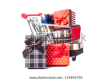 Shopping trolley full of Christmas presents. Christmassy gifts.