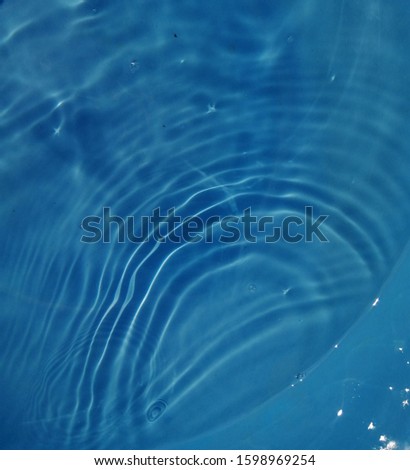 Blue water reflected by sunlight