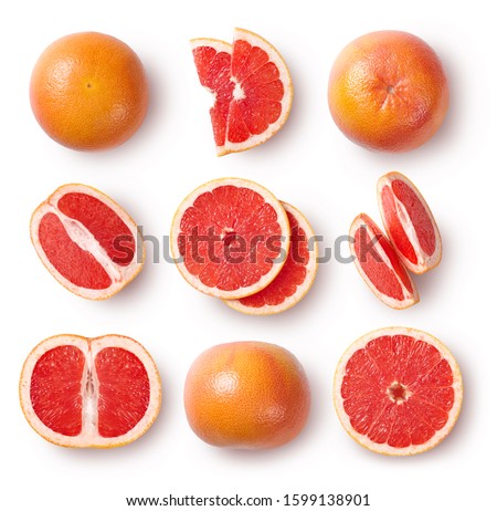 Whole and sliced grapefruits isolated on white background. Top view. Royalty-Free Stock Photo #1599138901