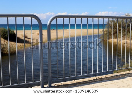 fence in a city park on the shores of the Mediterranean Sea in Israel
