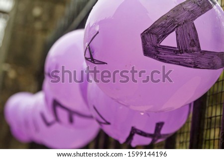 Violet ballons as a feminist symbol