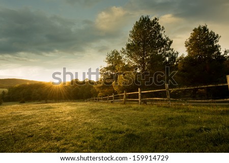 Beautiful sunrise on the farm Royalty-Free Stock Photo #159914729