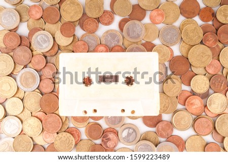 Picture of a Business Money Concept Idea Musicassette Tape and Coin