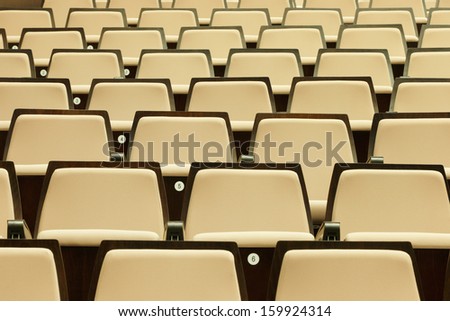 A beautiful pattern of auditorium seats built to celebrate gatherings of people, primarily for education and entertainment