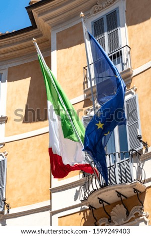 Italian and European flags fluttering