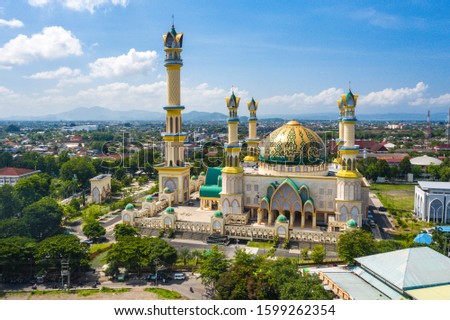 Islamic Center NTB - mosque in the city of Mataram. Indonesia. Lombok Island. Aerial photography. Royalty-Free Stock Photo #1599262354