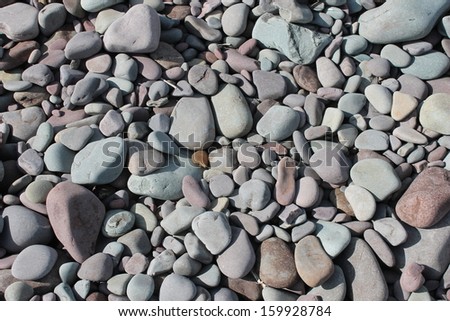 pebbles stones grey background macro nature Grey rock on beach shore stock, photo, photograph, image, picture,  
