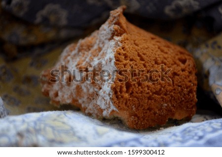 English Half baked muffin with sugar.
