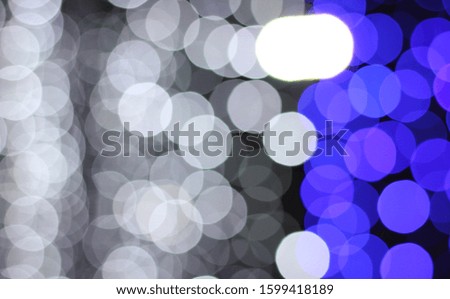 Elegant abstract defocused light. Blue and white color bokeh. Abstract bokeh background concept.