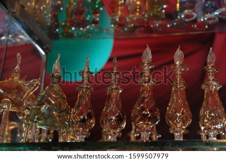 arabic incense bottles on a shelf