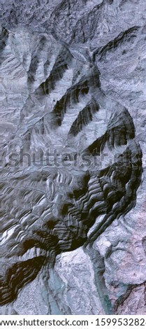 invasion, vertical abstract photography of the deserts of Africa from the air, aerial view of desert landscapes, Genre: Abstract Naturalism, from the abstract to the figurative, 