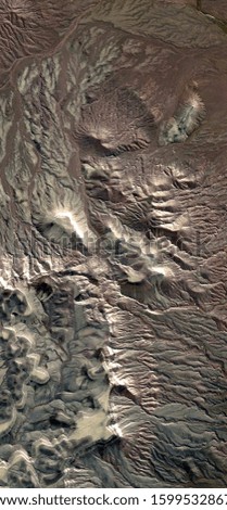 relief, vertical abstract photography of the deserts of Africa from the air, aerial view of desert landscapes, Genre: Abstract Naturalism, from the abstract to the figurative, 