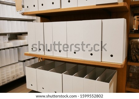 Simple file case lined up in a store