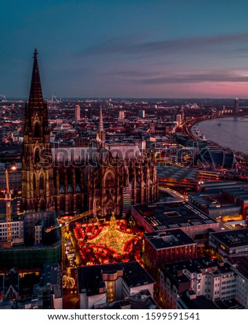 Cologne Germany skyline during sunset in December advent week with Christmas market Cologne by the Cathedral 