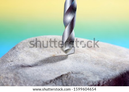 Stone drill with point for drilling in natural stone and concrete photographed in the studio                           