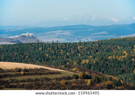Spis castle (one of the biggest European castles) with High Tatras mountains in the background, Slovakia