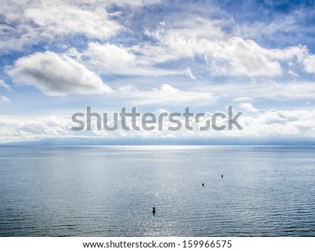 Picture of the lake Bodensee with blue sky and white clouds