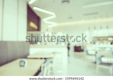 Abstract blur coffee shop and restaurant interior room for background
