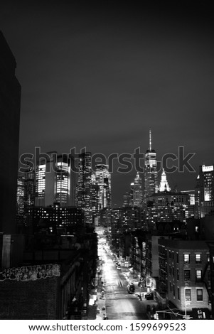 Street photography in New York City. Life and skyline in black and white.