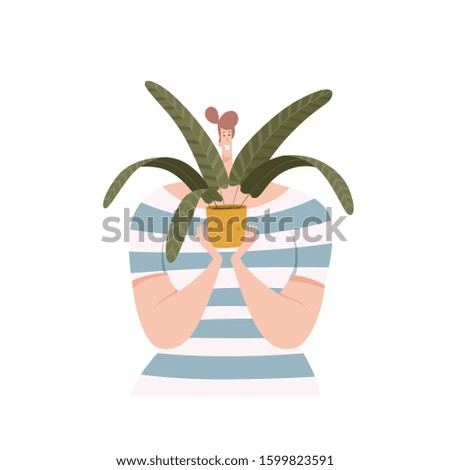 Joyful woman holds a plant. Isolated on white background.