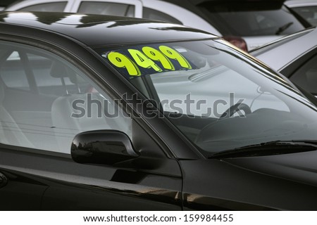 auto for sale in a used car lot. Royalty-Free Stock Photo #159984455