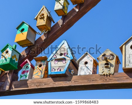 Birdhouses, the houses for birds. Decorated birdhouses and ornamented.