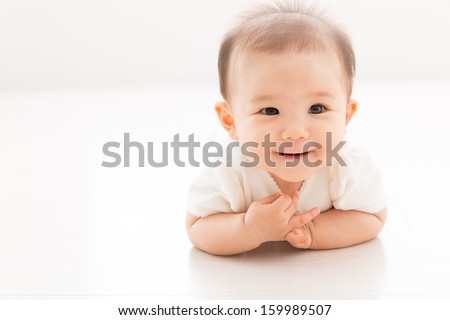 asian baby in the room Royalty-Free Stock Photo #159989507
