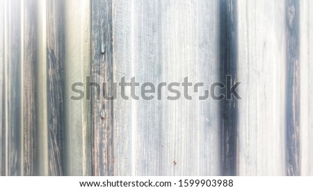 Light blue white-washed painted wall. Textured background with copy space.
