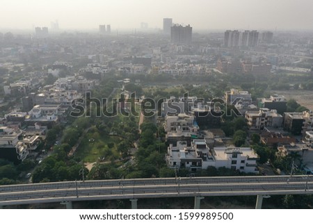 Entire city lock down due to corona virus outbreak, empty streets, no traffic on road, no people, ,emergency situation. aerial drone view of city. covid-19 outbreaks in delhi,  india. 