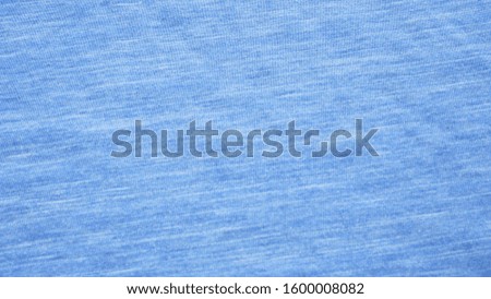 Blue background from fabric. Crumpled fabric background close-up.