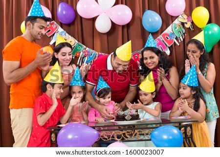  Group of children having fun at birthday party