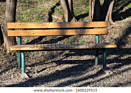 Wooden bench along a country path