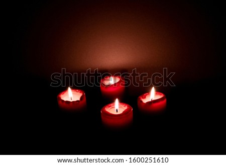 Lit candles for memorials and thinking of all loved ones