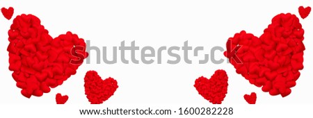 Valentine's day banner with red hearts made of small hearts isolated on white background. Copy space.
