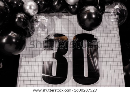 birthday thirtieth  anniversary decoration with black and silver balloons